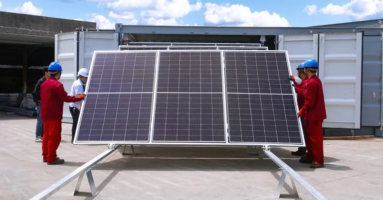 Transporting refugee solar containers in compliance with ISO 668 standards